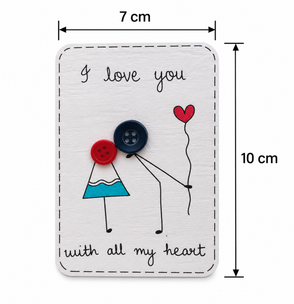 A rectangular white card with rounded corners, shown with dimension lines indicating 7 cm width and 10 cm height. The card has a stitched border, the phrase 'I love you with all my heart' in black script, and a simple stick-figure style illustration with a red heart, a red button, a blue button, and a blue triangle.